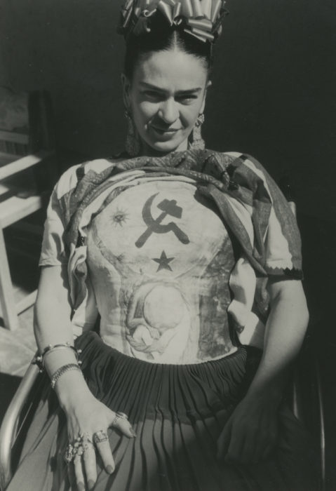 <p>Florence Arquin (American, 1900–1974). <em>Frida Wearing Plaster Corset, Which She Decorated with Hammer and Sickle (and Unborn Baby), Coyoacán</em>, 1951. Gelatin silver print. Courtesy of Throckmorton Fine Art, New York. </p>
