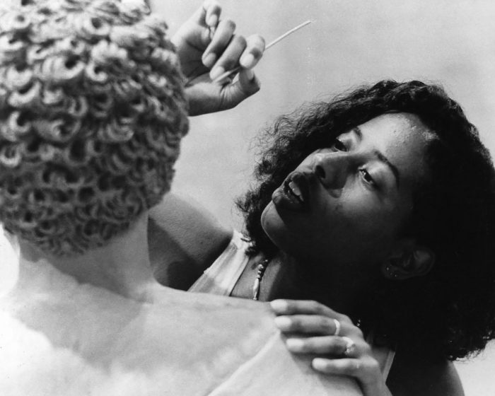 <p>Vinnie Bagwell Sculpting “The First Lady of Jazz Ella Fitzgerald,” 1996. Photograph by Roderick V. Taylor. Courtesy of Vinnie Bagwell.</p>
