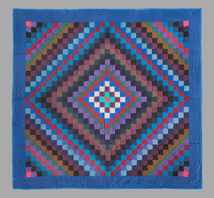 <p>Artist unidentified. Amish, United States. <em>Sunshine and Shadow Quilt</em>, 1920s. Silks and wools, 83 x 75 ½ inches. American Folk Art Museum, New York. Gift of Karen and Werner Gundersheimer, 2018.2.6. Photo by Gavin Ashworth.</p>
