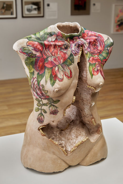 <p>Camille Eskell (American, b. 1954). <em>Tattooed Lady: Comin’ Up Roses</em>, 2003. From the <em>TRUNCATED</em> series. Resin, graphite, colored pencil, false teeth, watercolor, and mixed media. Collection of the Hudson River Museum. Gift of Mrs. Louis Aston Knight, by exchange, 2018 (2018.12.2). © Camille Eskell. Photo: Steve Paneccasio.</p>
